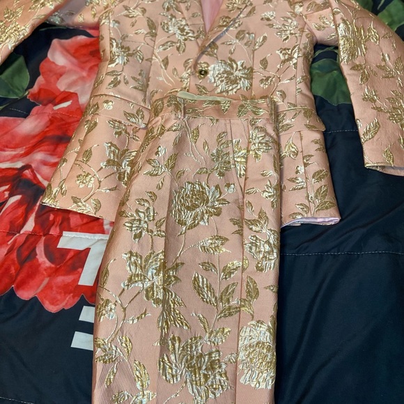 Color: Light pink/rose color prom suit.
Style: Allen-21. Size: small - Picture 4 of 5